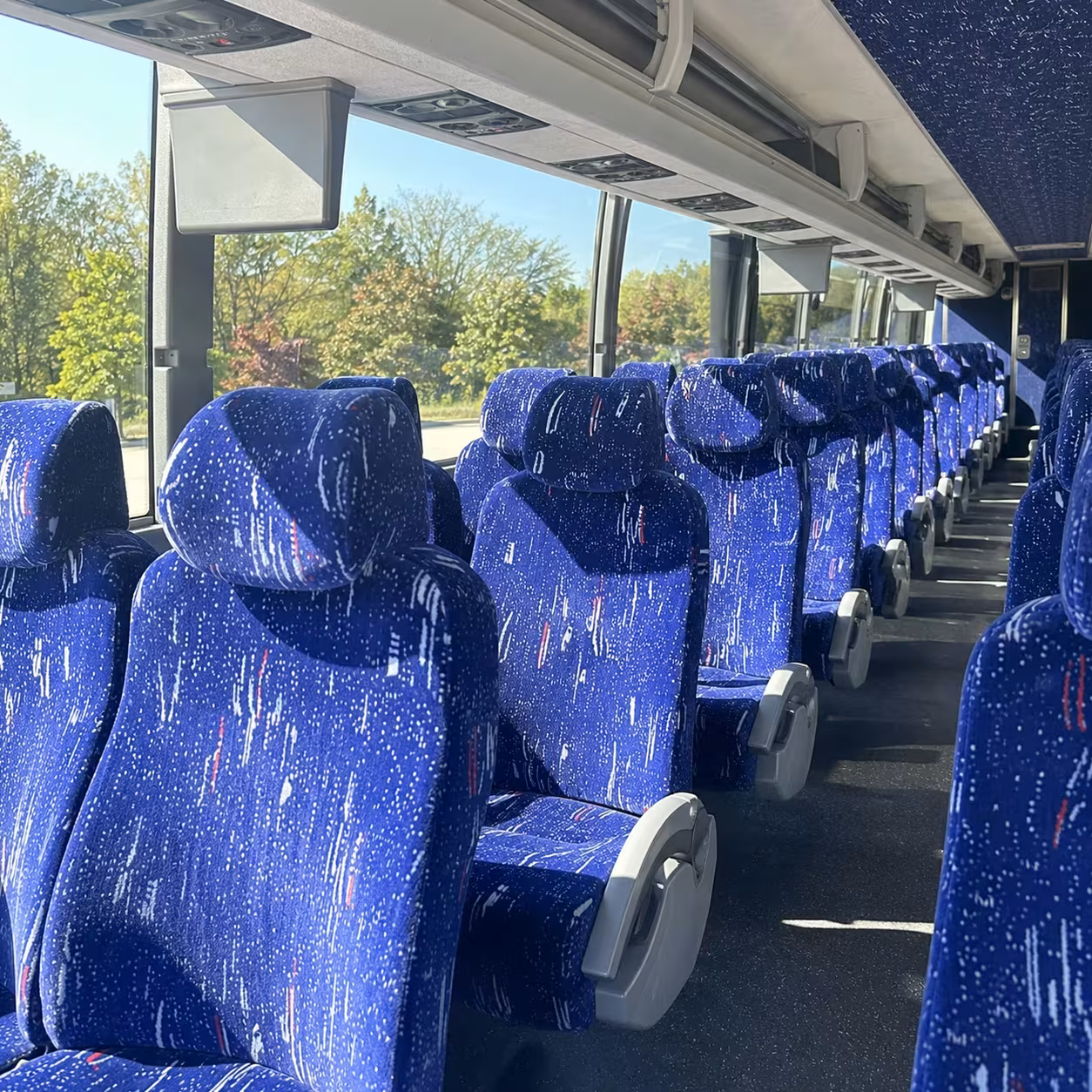 how distance and duration affect charter bus rates in southfield